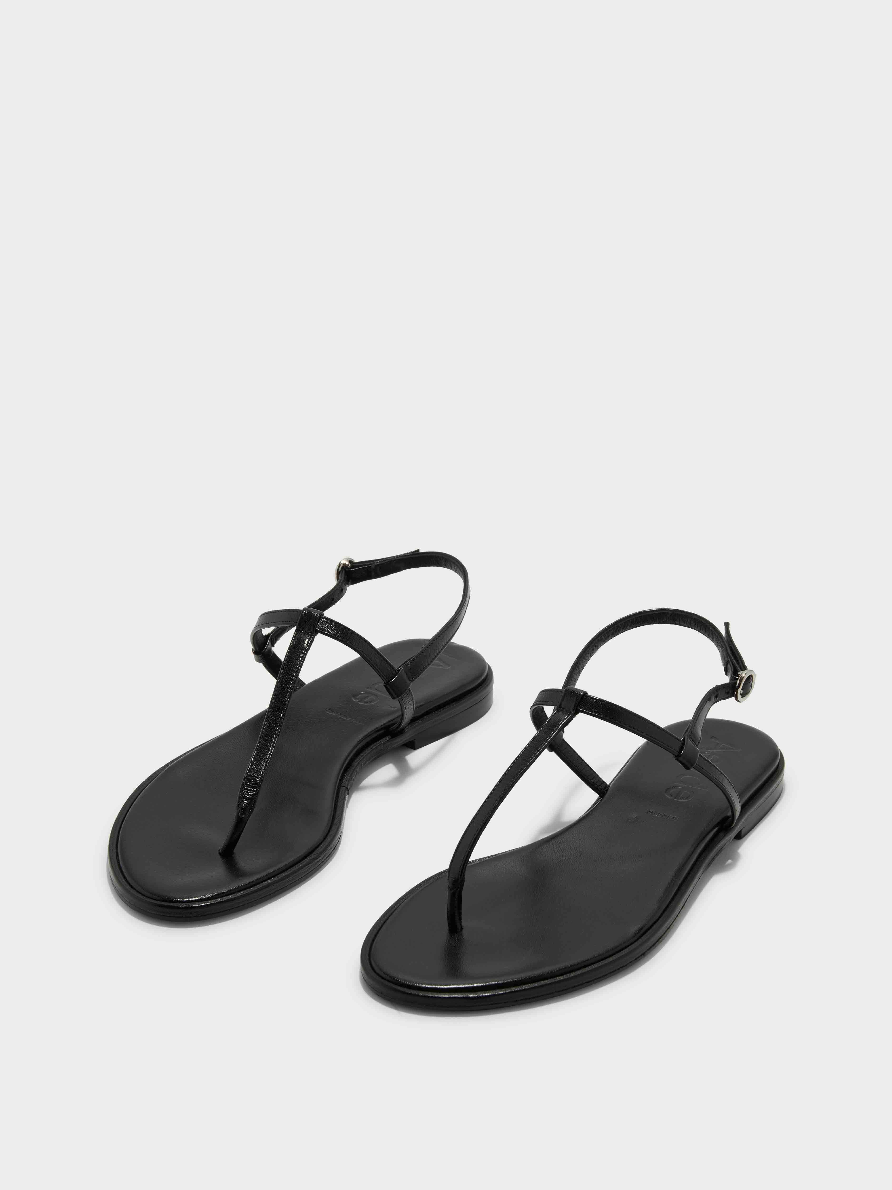 Aeyde | Nala T-Bar Sandals Leather Flat Sandals for Women | Black Nappa | Round Toe | Flat Heel | On Feet
